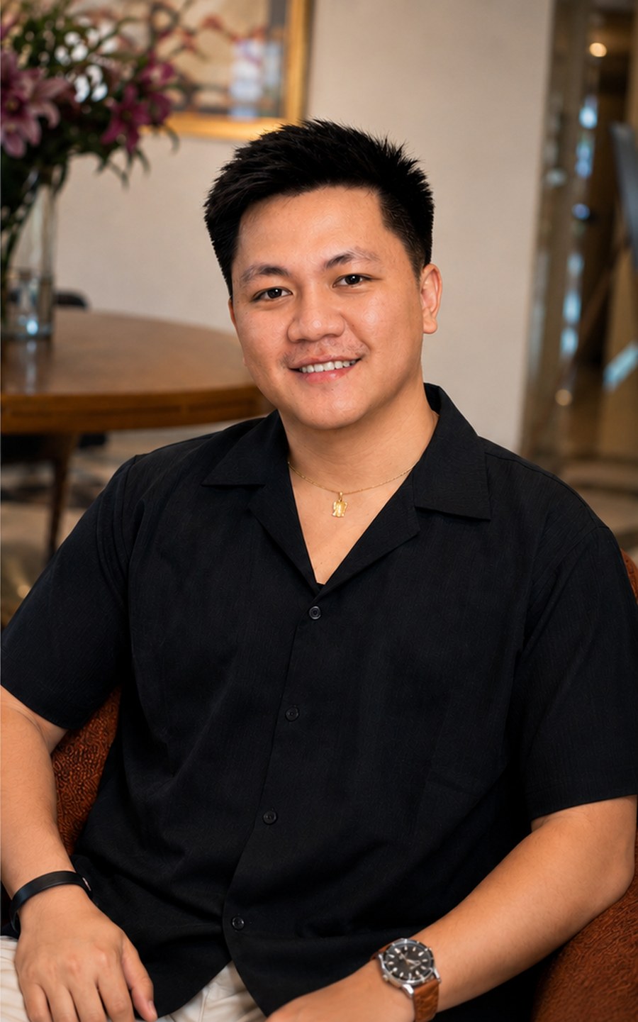Junrey Quico in a relaxed professional setting
